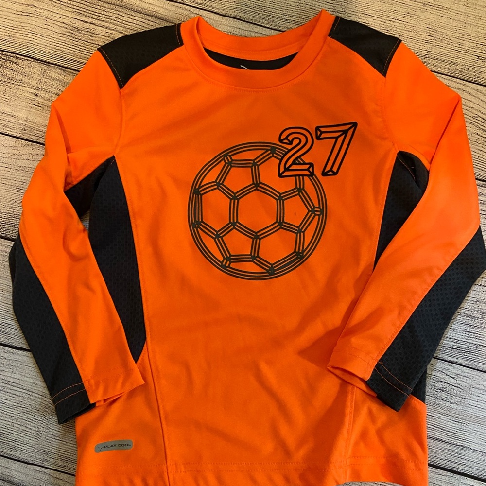 Orange and grey active wear shirt